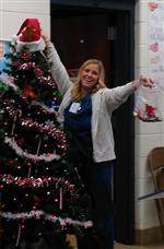Nurse Dylan Decorating a Christmas Tree